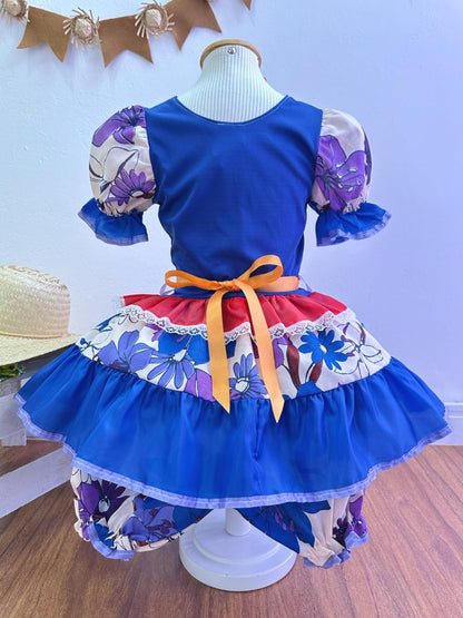 Disfraz infantil de junio con flores de colores azules y rojas 