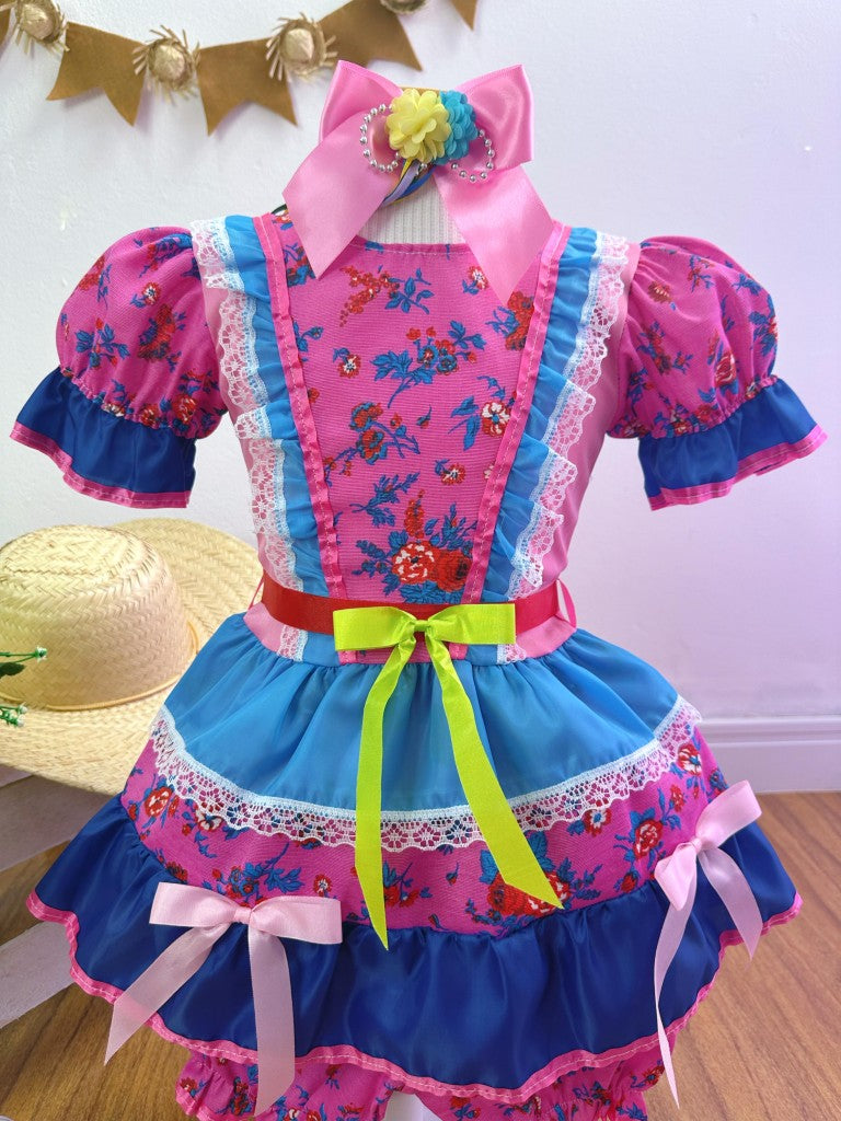 Disfraz infantil de junio con flores de colores rosa y azul 