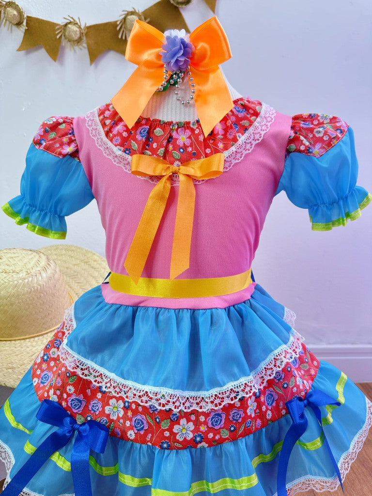 Vestido infantil de junio rosa y azul con flores de colores 