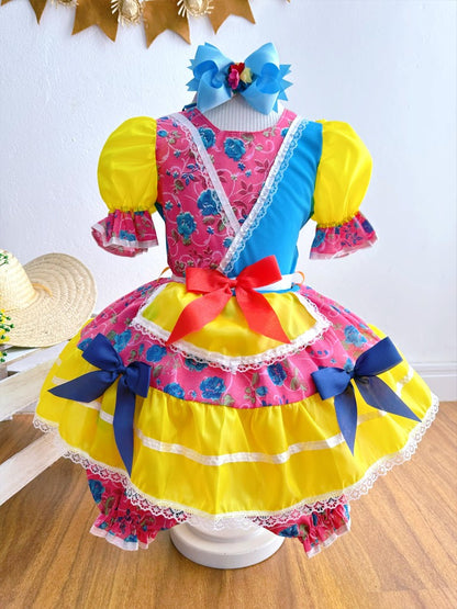 Vestido infantil de junio rosa y amarillo con flores de colores 