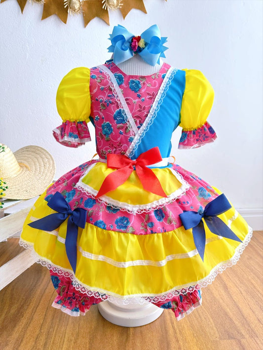 Vestido infantil de junio rosa y amarillo con flores de colores 