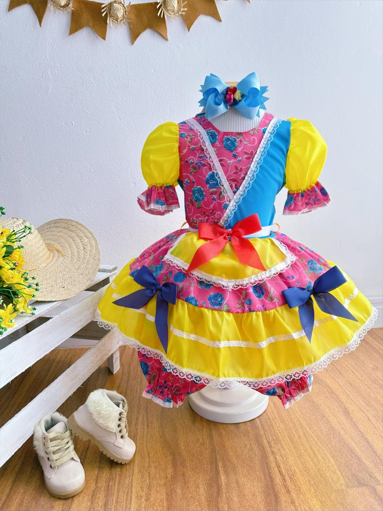 Vestido infantil de junio rosa y amarillo con flores de colores 