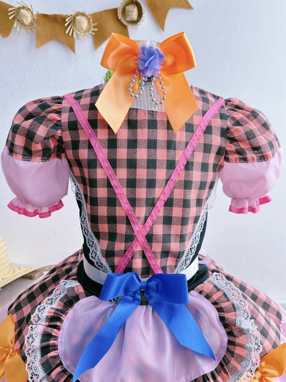 Disfraz infantil de junio en cuadros rosas y negros 