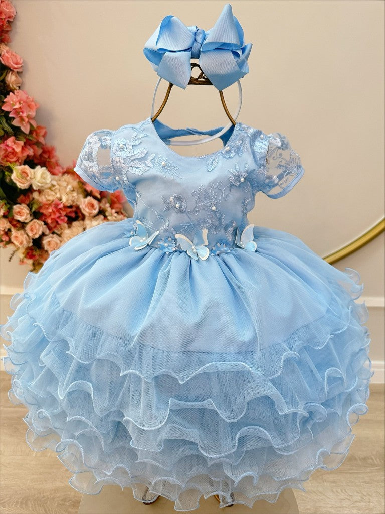 Vestido infantil azul claro Jardín Encantado con falda con volantes