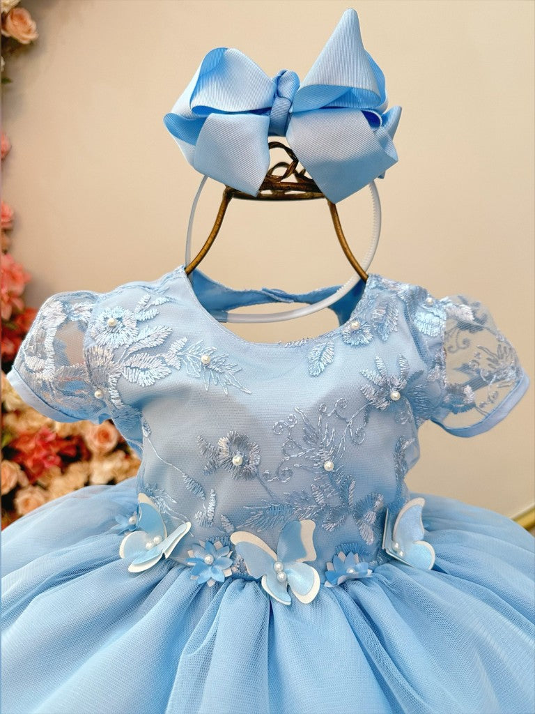Vestido infantil azul claro Jardín Encantado con falda con volantes