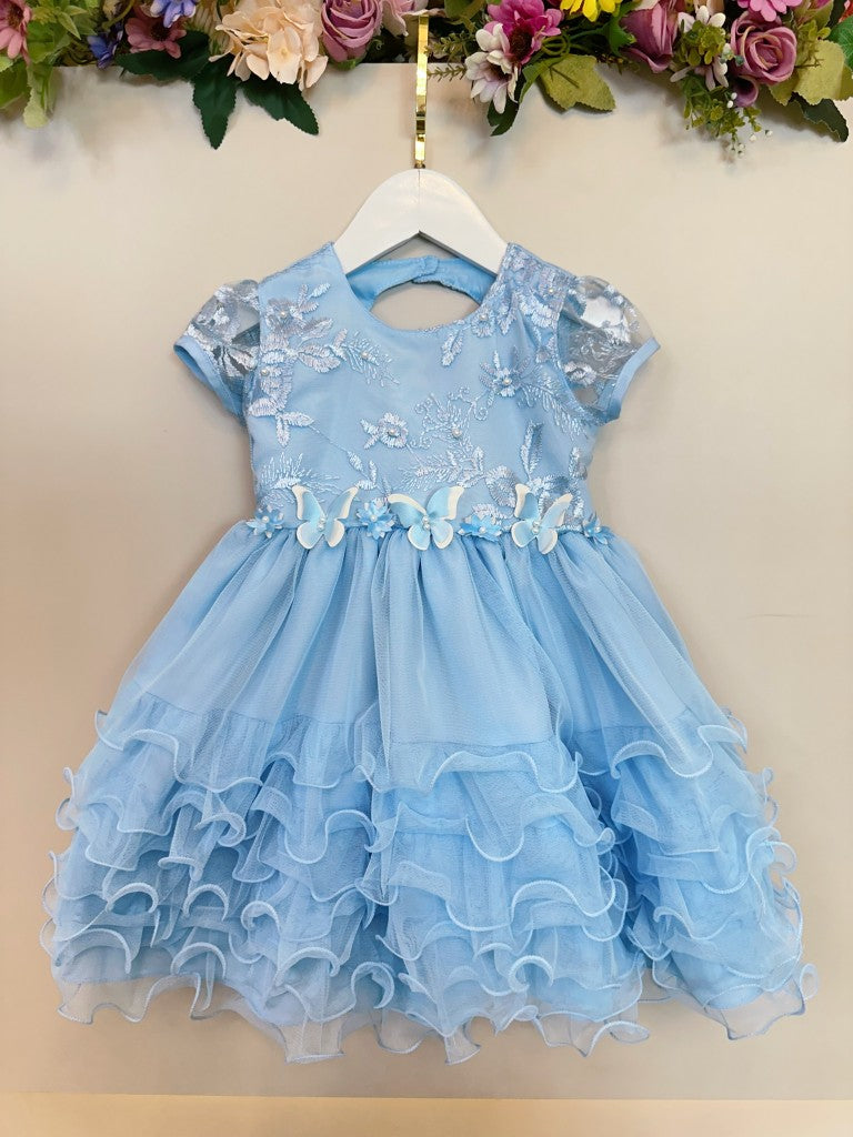 Vestido infantil azul claro Jardín Encantado con falda con volantes