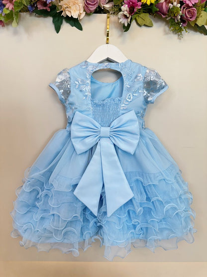 Vestido infantil azul claro Jardín Encantado con falda con volantes