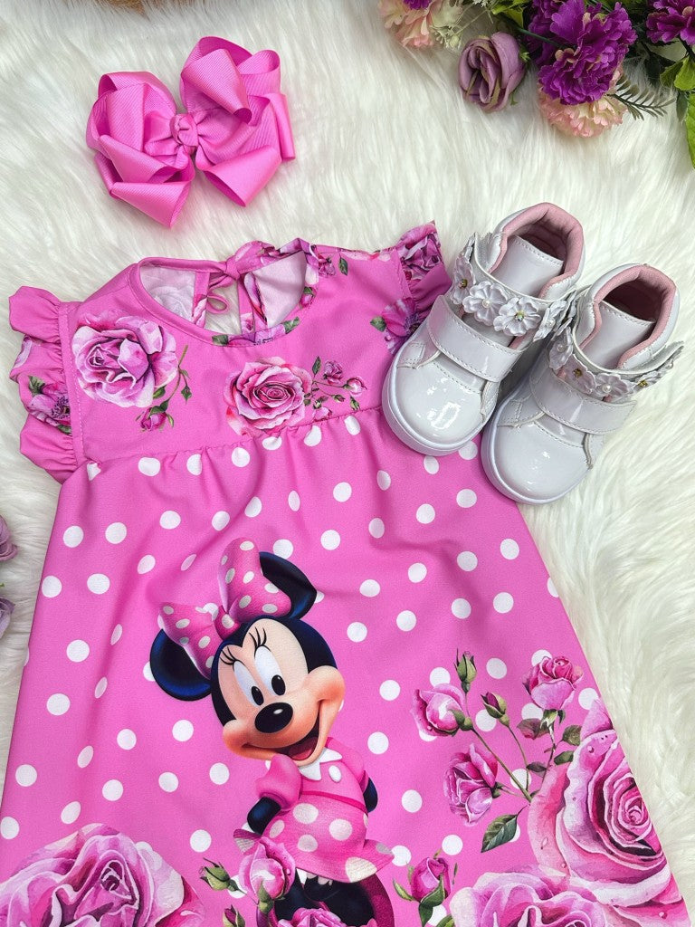 Vestido trapecio infantil de Minnie Mouse en rosa con mangas esponjosas