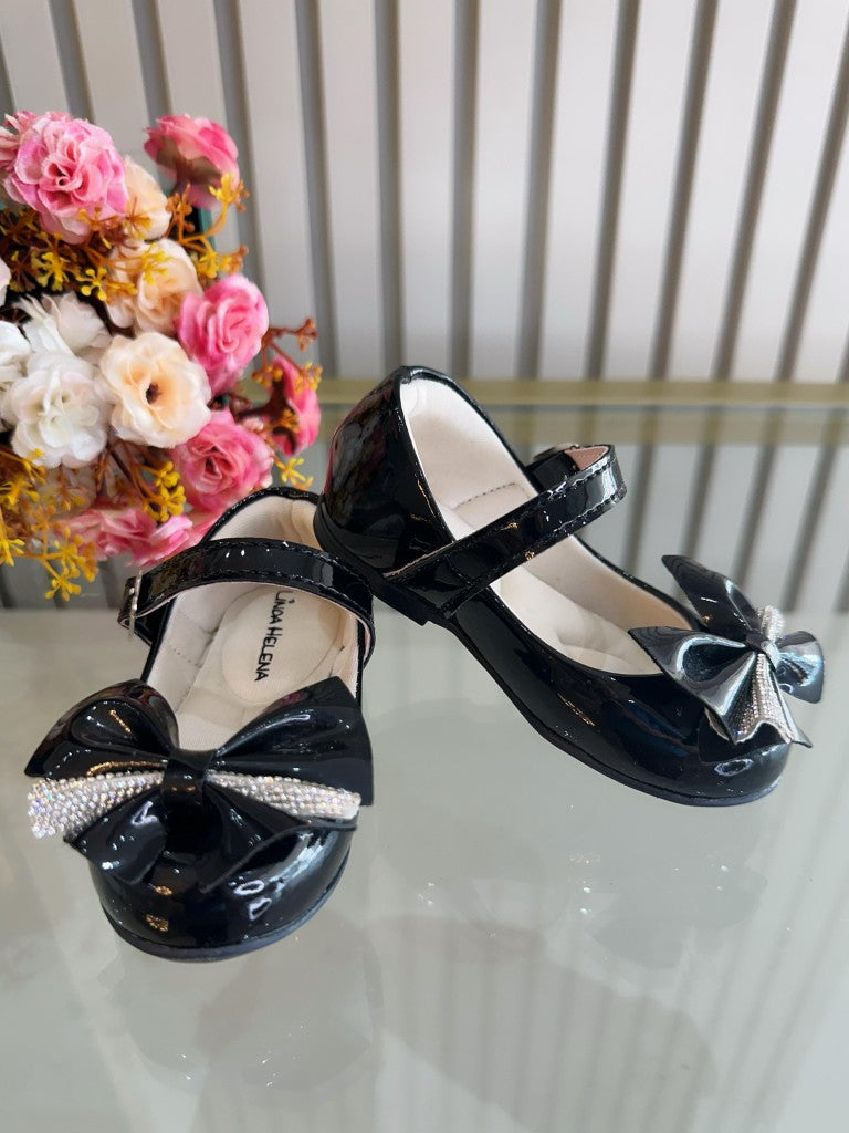 Zapato de charol negro con aplique de lazo de diamantes de imitación de lujo 