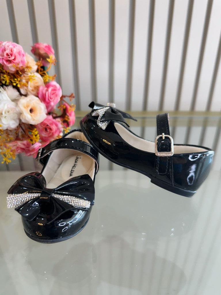 Zapato de charol negro con aplique de lazo de diamantes de imitación de lujo 