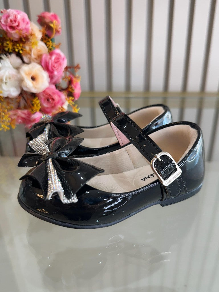 Zapato de charol negro con aplique de lazo de diamantes de imitación de lujo 