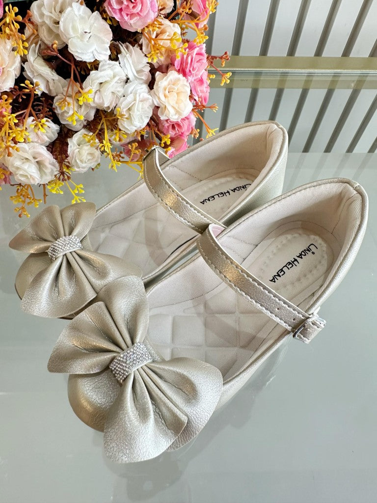 Zapato de tacón dorado mate con lazo y aplique de diamantes de imitación