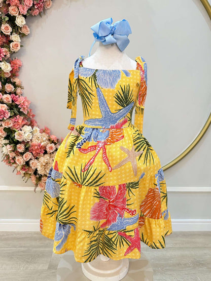 Vestido infantil casual de primavera con estampado floral amarillo y colorido 