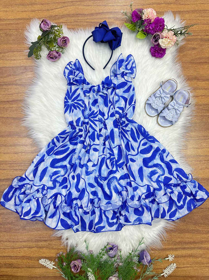 Vestido infantil informal de primavera con estampado floral azul 