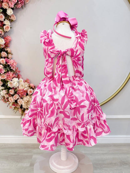Vestido infantil informal de primavera con estampado floral rosa chicle 