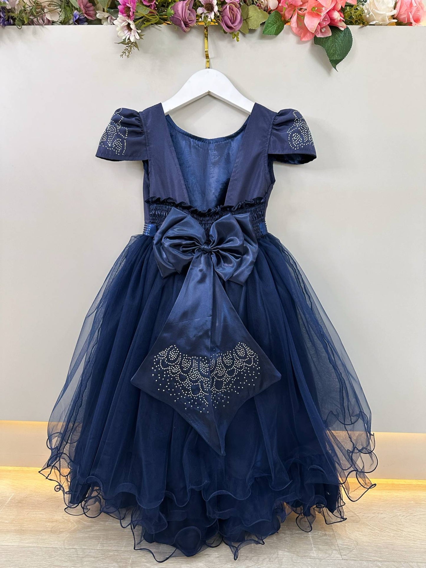 Vestido infantil azul marino con pedrería de lujo
